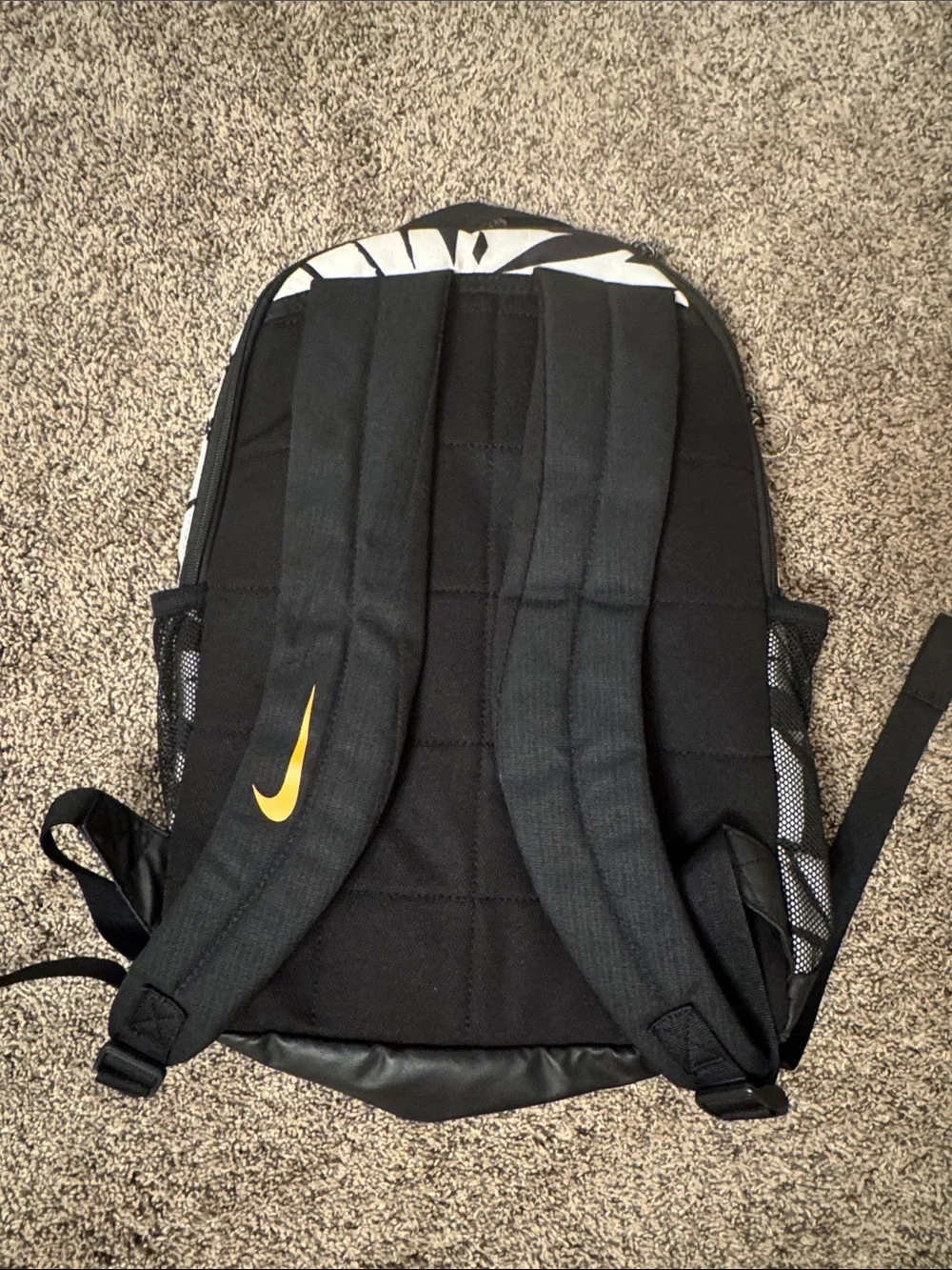 Nike Black & White Backpack with Orange Swoosh